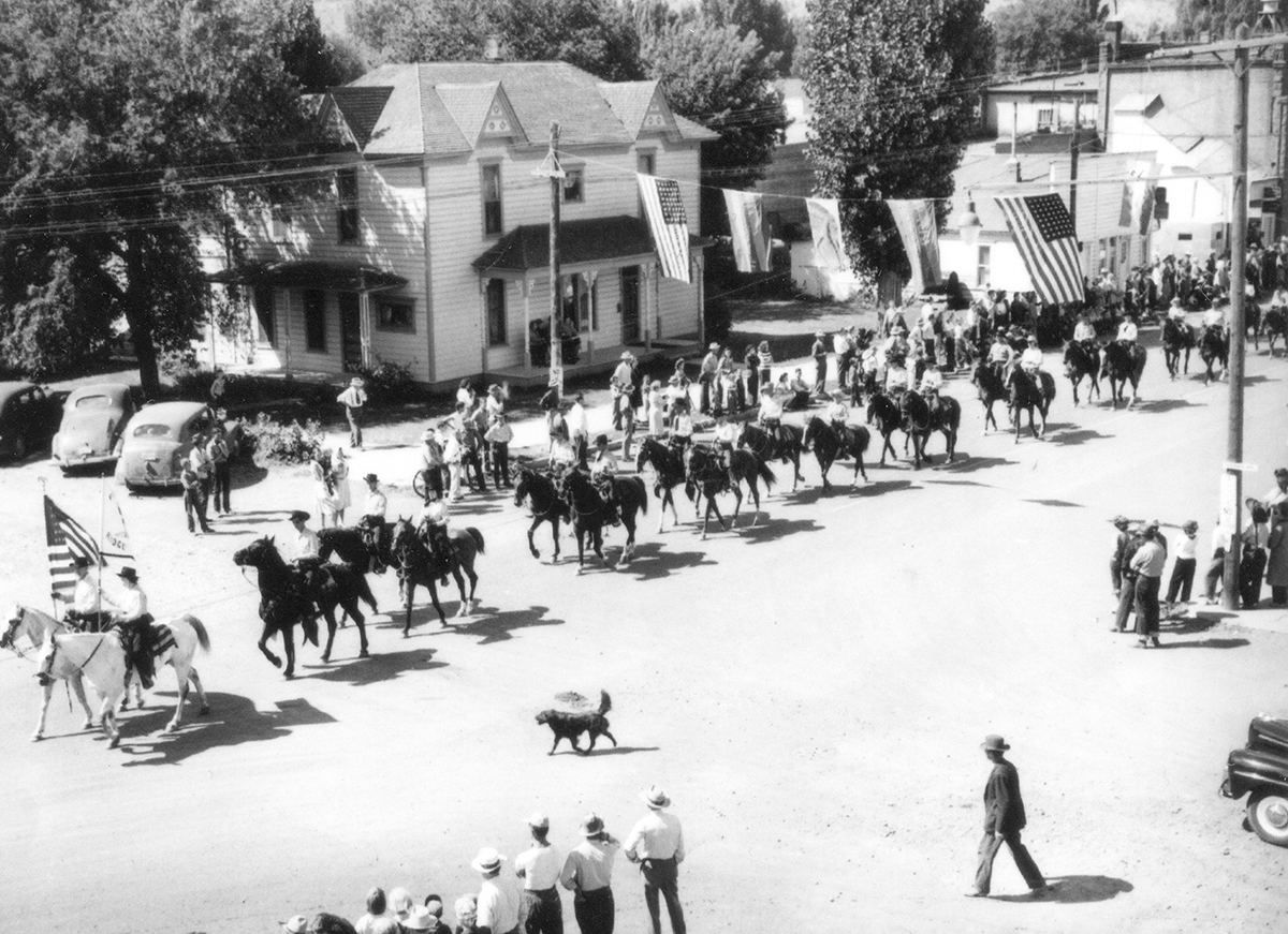 Parade in Prineville showing Belknap House 1946